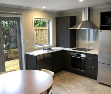Located in the heart of the city, this stylish In The City townhous... - Photo 1
