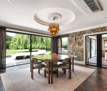 An immaculately curated village home set in gardens with a pool and... - Photo 3