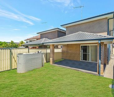 Stylish 4-Bedroom Family Home in Prime Location - Photo 1