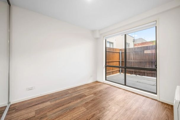 Contemporary Warehouse-Style Living in a Boutique Building - Photo 1