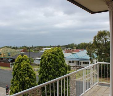 TOP FLOOR APARTMENT WITH OCEAN VIEWS - Photo 1