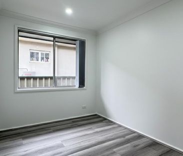 FRESHLY RENOVATED HOME OPPOSITE PARK | GARAGE & WORKSHOP! - Photo 4