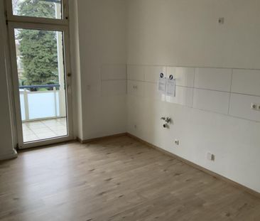 Altbauwohnung mit geräumiger Wohnküche, Balkon und hellem Wannenbad - Photo 6