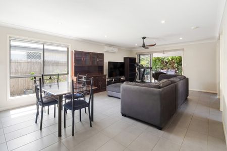 Stunning Family Home with Solar Power, 5 Air Conditioners & Premium Lifestyle Location - Photo 2