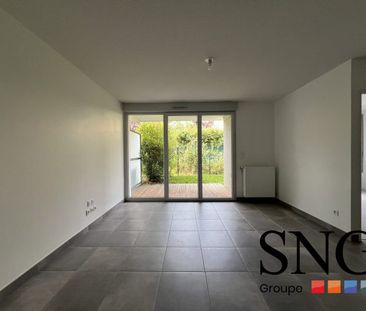 T2 AVEC JARDIN + 2 PARKINGS - Photo 1