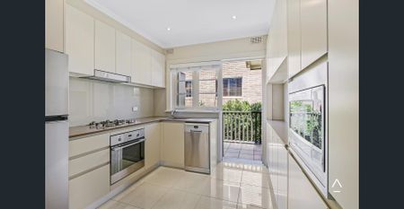 A sun-filled sanctuary in a refurbished block of only four - Photo 3