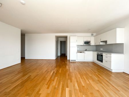 Helle DG-Wohnung mit großer Terrasse im Viola Park - Photo 2