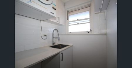 BRIGHT AND SUNNY TOP FLOOR UNIT - Photo 3