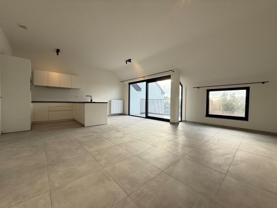 Twee-slaapkamerappartement op een centrale ligging in Ooigem. - Photo 1