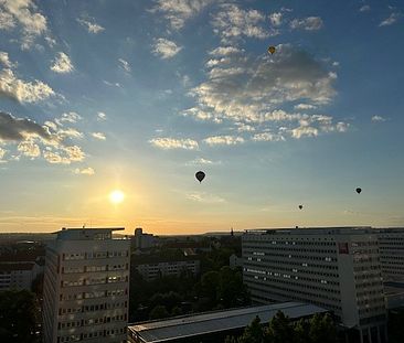 Wunderschöner Ausblick aus Ihrer einzigartigen Penthouse Wohnung im 11. OG – mit traumhaften Sonnenuntergang! - Photo 5