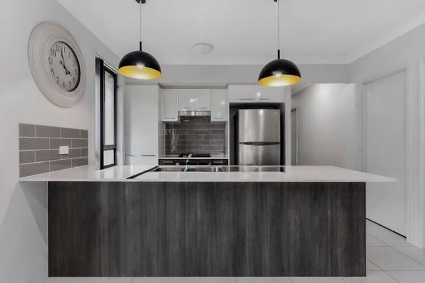 Modern Comfort and Convenience in a Peaceful Airds Location - Photo 1