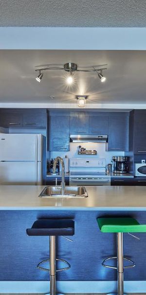 **Condo 4 1/2 à partir du 13 décembre 2025, Loyer : 1 990$/mois** - Photo 1