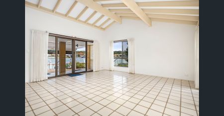 Waterfront Family Home with Pool & Triple Garage - Photo 2