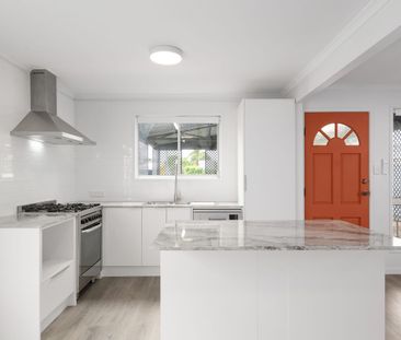 Freshly Renovated Family Home in Premier Riverside Pocket - Photo 1