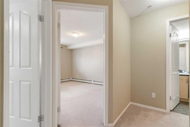 2 Bed Condo In Mc Kenzie Town | Undergound Parking | Heat And Water Included. Special Incentive - Photo 1