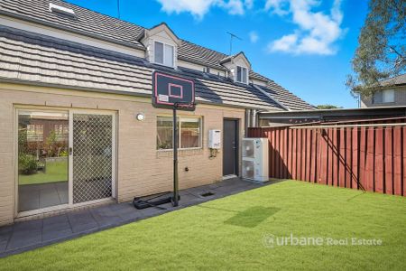 “Spacious Home with low maintenance backyard” - Photo 4