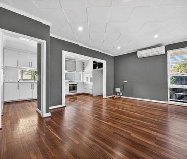 Charming Cottage-Style Living with Modern Comforts - Photo 1