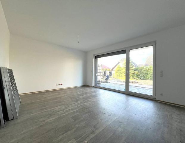 Exklusive Erdgeschosswohnung mit Garten, Terrasse und Stellplatz am Muldestausee in Pouch - Photo 1