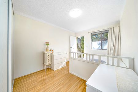 Updated Double Brick 2 Bedroom Unit in Prime Location - Photo 3