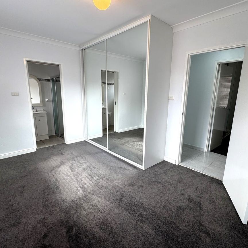 Freshly Painted - Four Bedroom Home - Photo 1