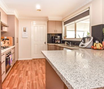 Comfortable & Low-Maintenance Living in a Quiet Location - Photo 3