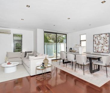 Striking Style, Sophisticated Living - Spacious Three-Level Townhouse! - Photo 3