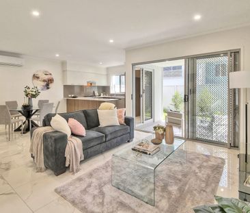 Modern & Spacious 4-Bed Townhome in Prime Location - Photo 1