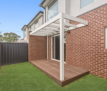 BRAND NEW - BE THE FIRST TO ENJOY - Located in Mckinnon School Zone - Photo 2