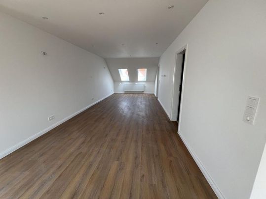 Erstbezug nach Sanierung: Charmante Dachgeschosswohnung - Foto 1