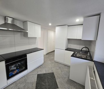 Appartement de 2,5 pièces au rez-de-chaussée - Photo 5