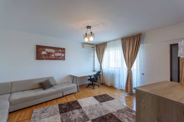 Titan - Costin Georgian, 1 minut metrou, garsoniera dubla... - Fotografie 1