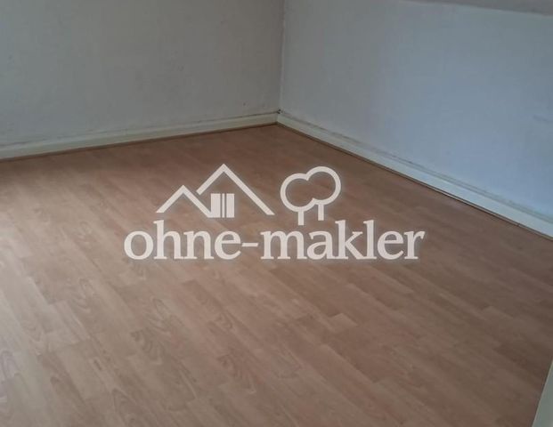 Großzügig geschnittene DG-Wohnung in verkehrsgünstiger Lage von Ratingen-Tiefenbroich zu vermieten - Foto 1