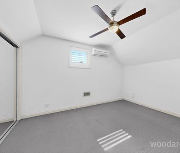 Stylish Town Residence with Indoor Outdoor Appeal - Photo 4