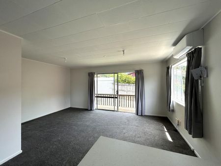 Freshly Updated 2 Bedroom Home Close to Schools and City - Ready Soon! - Photo 2