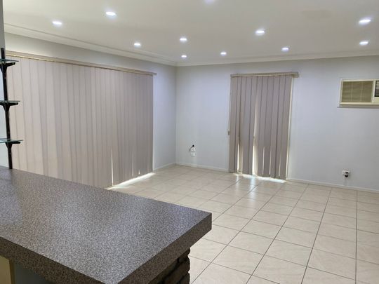 Five-Bedroom Home with Workshop & Double Garage - Photo 1