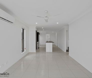 STUNNING 4 BED HOME WITH OPEN PLAN LIVING WITH AIR-CON - Photo 4