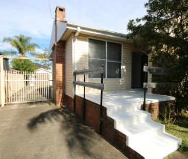 Neat & Spacious Home in a Convenient Revesby Location - Photo 1