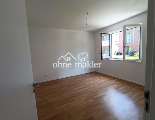 2-Raum-Wohnung mit EBK, Garten, Wasserblick, Erstbezug, Neubau mit Top Energieffizienzklasse - Foto 1