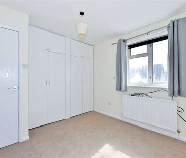 A two bedroom semi-detached home with garage and off street parking - Photo 1