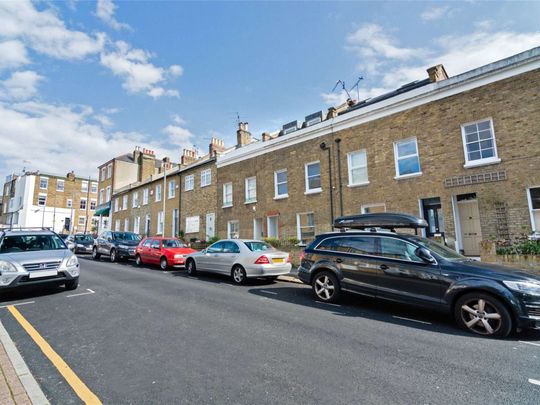 An ideal three bedroom cottage well located "between the commons" - Photo 1