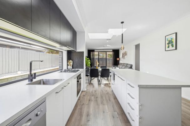Modern Family Home with Spacious Living and Excellent Location - Photo 1