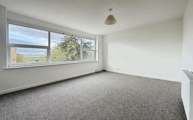 A beautifully refurbished four-bedroom house, finished to a high standard throughout. The property offers three double bedrooms, a single bedroom, modern bathroom and downstairs WC, spacious kitchen with separate dining area, garage and driveway providing off-road parking. - Photo 1