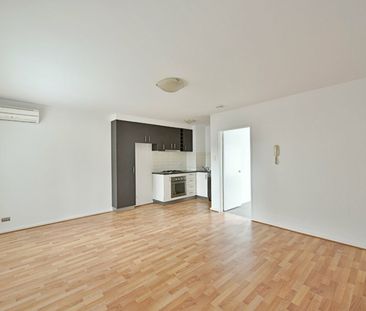 Register to Inspect // SPACIOUS APARTMENT WITH COURTYARD! - Photo 2
