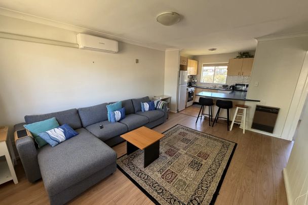 Conveniently Located 2-Bedroom Unit with Garage - Photo 1