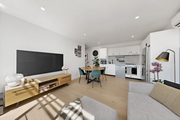 Spacious, secure and superbly located apartment living - Photo 1