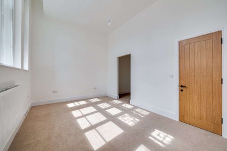 An exceptional two bedroom apartment offering impressive proportions, and soaring ceilings seamlessly blending period character with contemporary living - Photo 2