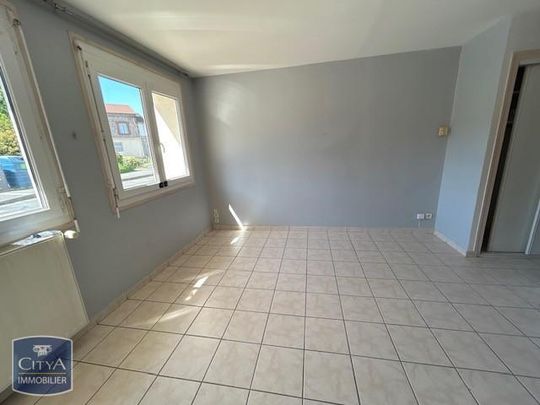 Location Appartement 2 pièces 34m² LE CHAMBON FEUGEROLLES 42500 - Photo 1