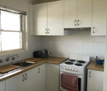 Beachside Living at Its Best - Upstairs Coastal Gem on the Esplanade - Photo 4