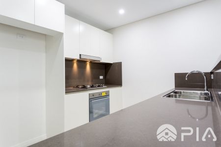 Rental Property Advertisement: Modern 1 Bedroom + Study Apartment with Parking! - Photo 2