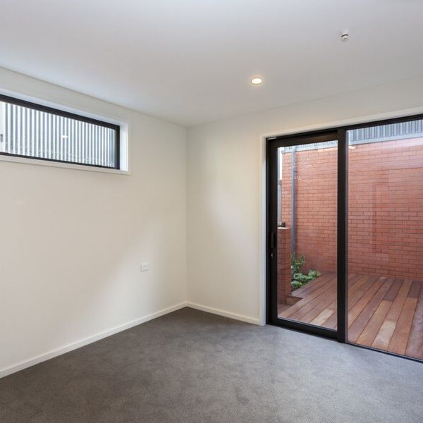 NEAR NEW spacious 2 bedroom townhouse in the city! - Photo 1